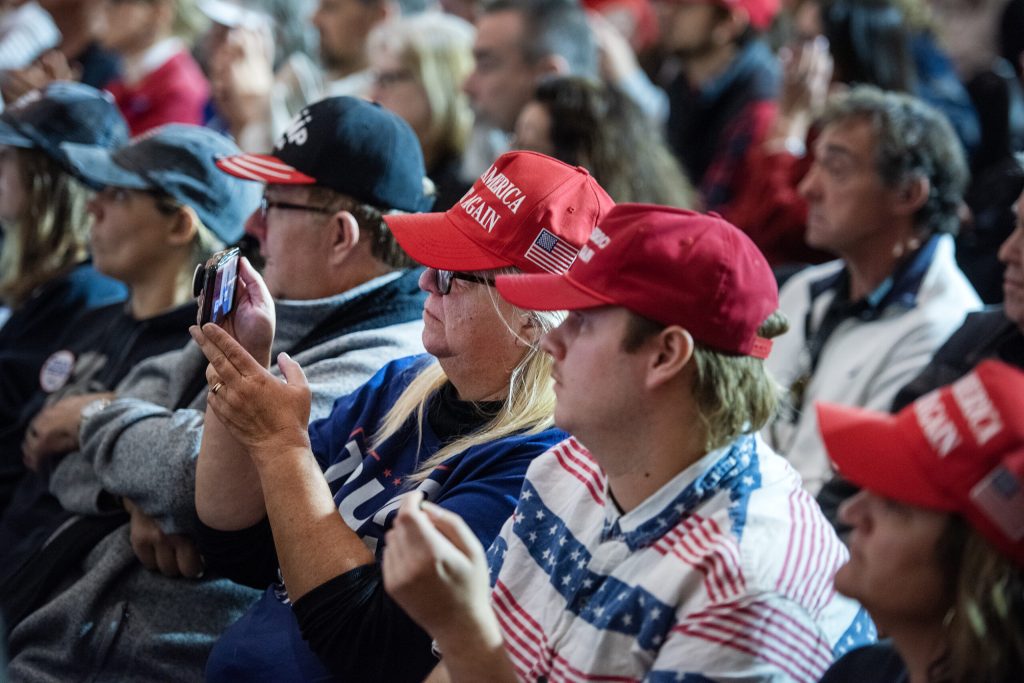 Supporters of Republican vice presidential candidate JD Vance listen to him speak Monday, Oct. 28, 2024, at Racine Memorial Hall in Racine, Wis. Angela Major/WPR