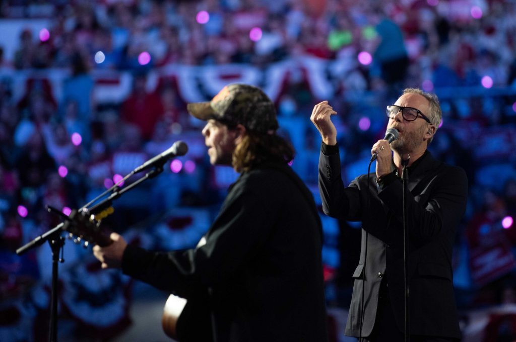 Matt Berninger and Aaron Dessner from The National perform at a rally for VP Kamala Harris at the Alliant Energy Center in Madison, Wis., on Oct. 30, 2024. Angela Major/WPR