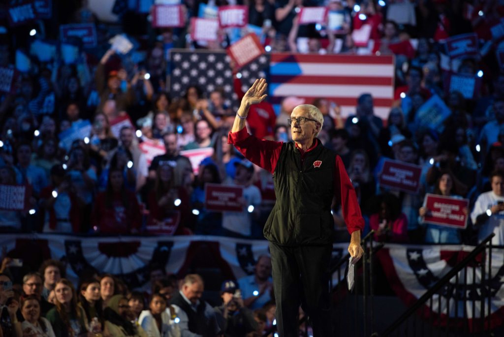 Wisconsin Gov. Tony Evers greets the crowd at a rally for VP Kamala Harris on Oct. 30, 2024 in Madison’s Alliant Energy Center. Angela Major/WPR