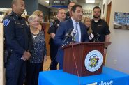 Attorney General Josh Kaul is joined by Wisconsin health officials and law enforcement at Forward Pharmacy Monona to encourage people to return old medications. Anna Marie Yanny / WPR.