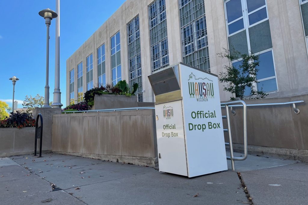 A ballot drop box was returned to outside Wausau City Hall on Sept. 30, 2024 after it was removed a week earlier by the city’s mayor. Rob Mentzer/WPR