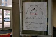 A sign at the door to the Wisconsin Elections Commission in Madison, Wis., on June 3, 2024. Anya van Wagtendonk/WPR