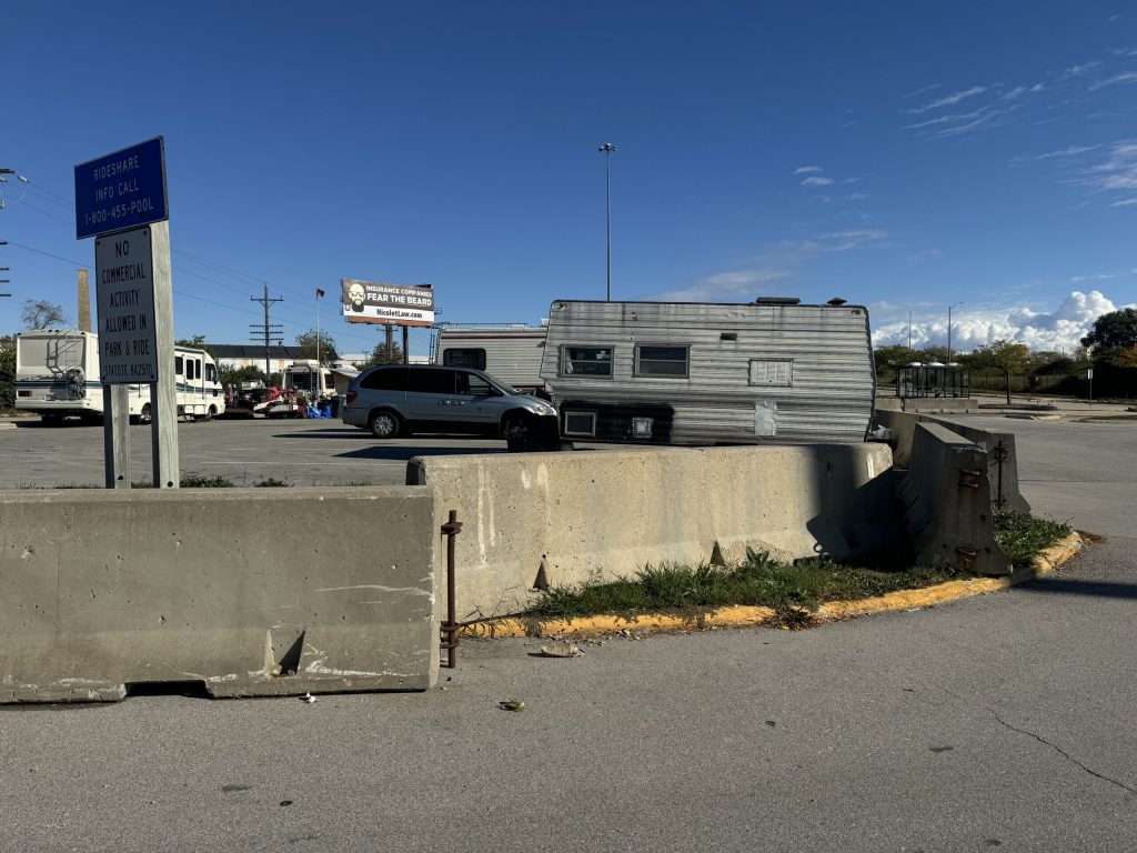 Homeless people have been living at the Holt Avenue park and ride in Milwaukee. Evan Casey/WPR