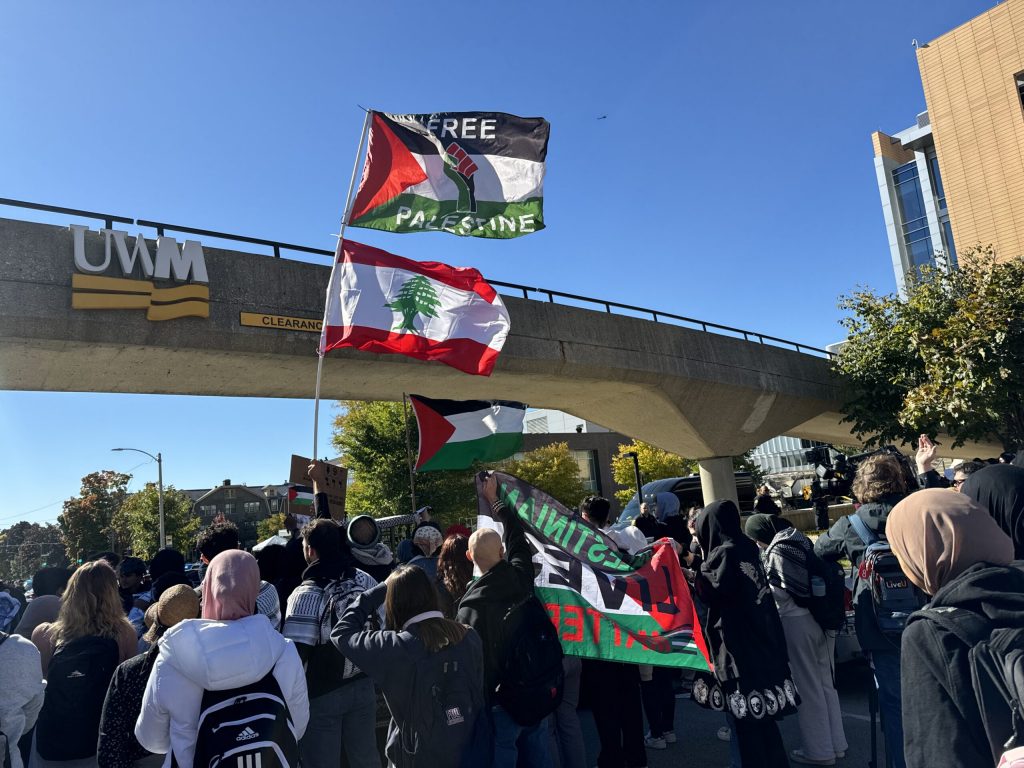 Protesters and students gather outside of the University of Wisconsin-Milwaukee on Thursday, Oct. 17, 2024, ahead of a visit from Vice President Kamala Harris. Evan Casey/WPR