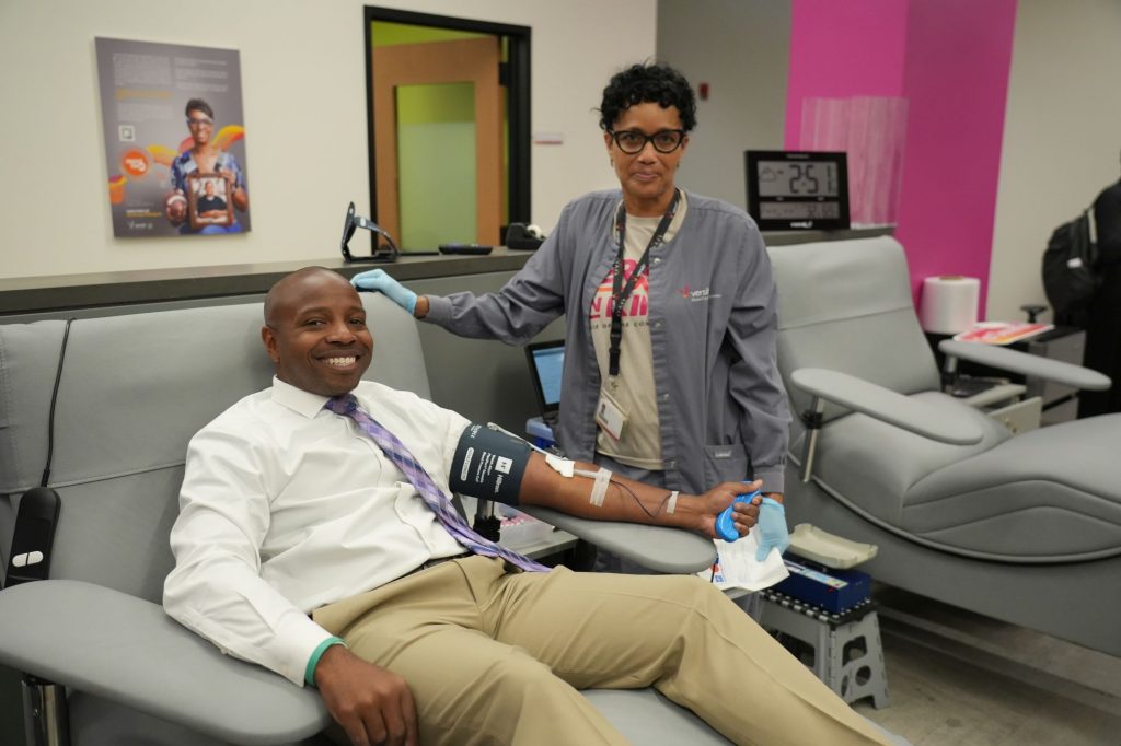 Mayor Cavalier Johnson donates blood. Photo by Jim Moy.