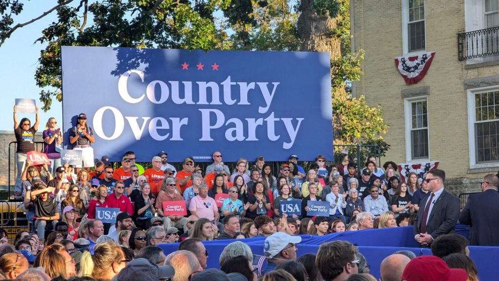 A crowd of Harris-Walz supporters applauds at a campaign rally in Ripon Thursday, Oct., 3, where former U.S. Rep. Liz Cheney, a Republican, spoke in support of Harris. (Baylor Spears | Wisconsin Examiner)