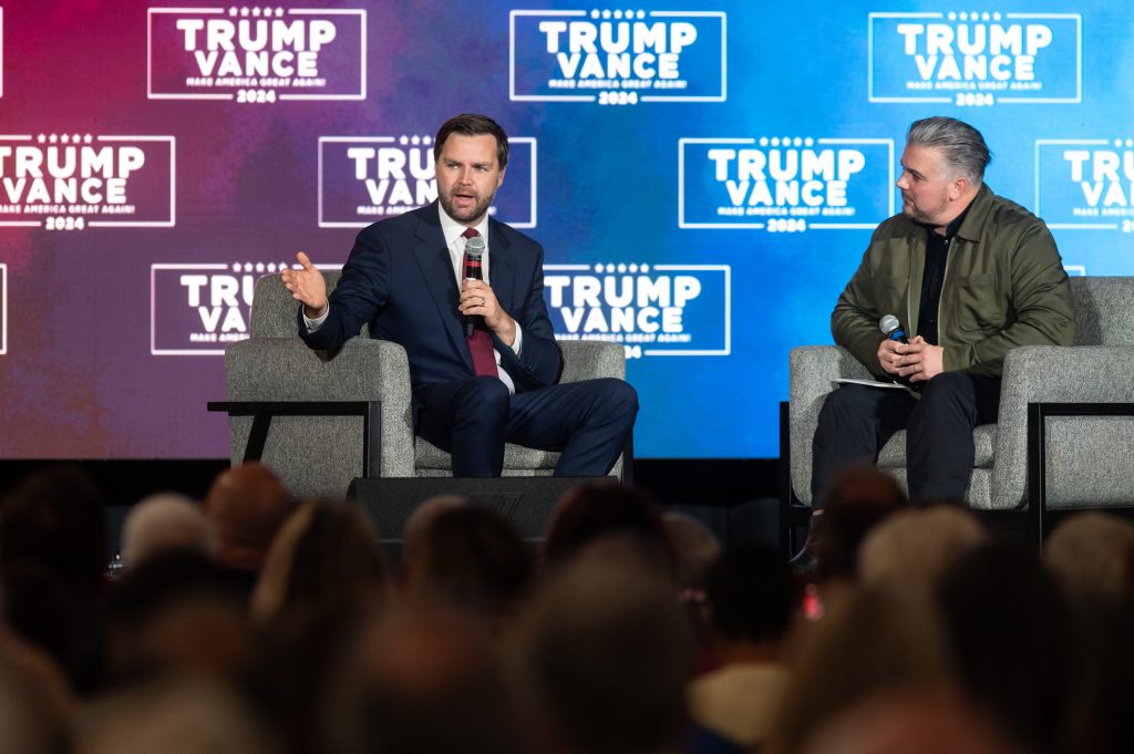 At the Courage Tour event in Monroeville, Pennsylvania, Lance Wallnau’s podcast hosted vice presidential candidate JD Vance, left, for a discussion on addiction and homelessness with Pastor Jason Howard. (Stephanie Strasburg for ProPublica)