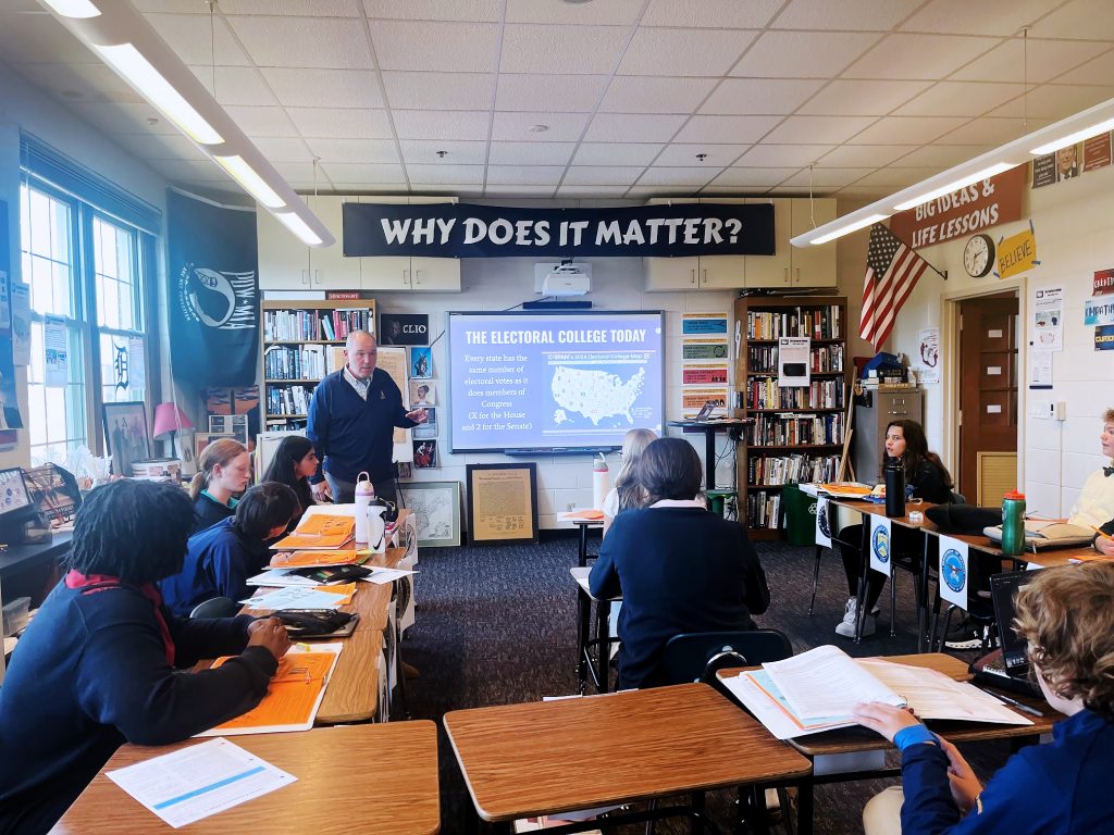 Chuck Taft is a social studies teacher at the University School of Milwaukee. He is teaching eighth graders about the Electoral College. Corrinne Hess/WPR