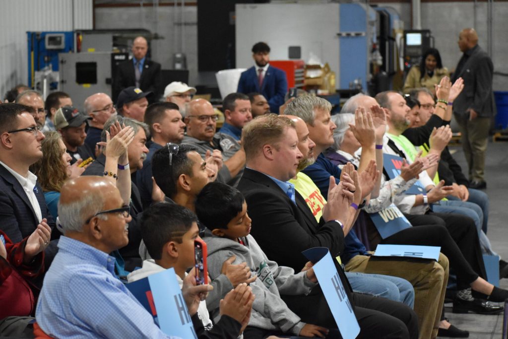 An audience of about 50 people attended Minnesota Gov. Tim Walz’s event at Manitowoc Pattern and Machining in Manitowoc, Wis. on Oct. 28, 2024. Joe Schulz/WPR