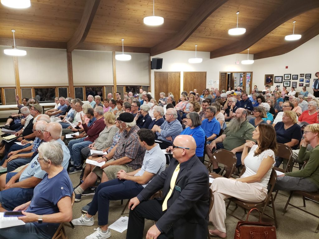 People gathered at the Southminster Presbyterian Church for a meeting of the Waukesha County Democratic Party on. Sept. 19, 2024. Shawn Johnson/WPR