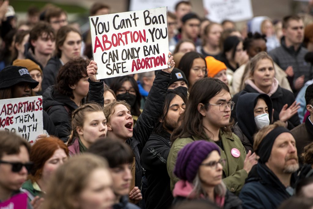 Protesters chant in front of the Wisconsin state Capitol in response to the U.S. Supreme Court’s draft ruling overturning Roe v. Wade on May 3, 2022, in Madison, Wis. Angela Major/WPR