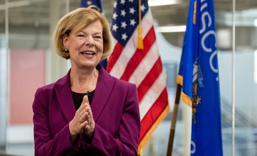 Sen. Tammy Baldwin smiles at the crowd as she speaks following her re-election to the US Senate on Thursday, Nov. 7, 2024, at Steamfitters Local 601 in Madison, Wis. Angela Major/WPR