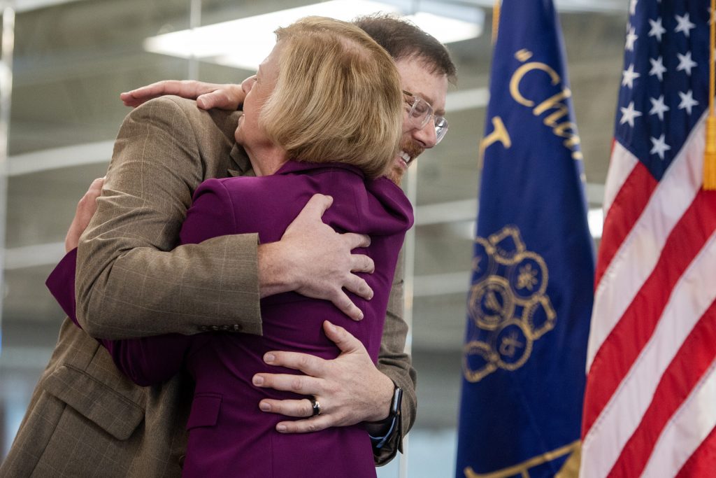 Ben Wikler, chairman of the Democratic Party of Wisconsin, hugs Sen. Tammy Baldwin after she defeated Republican Eric Hovde in a race for US Senate on Thursday, Nov. 7, 2024, at Steamfitters Local 601 in Madison, Wis. Angela Major/WPR