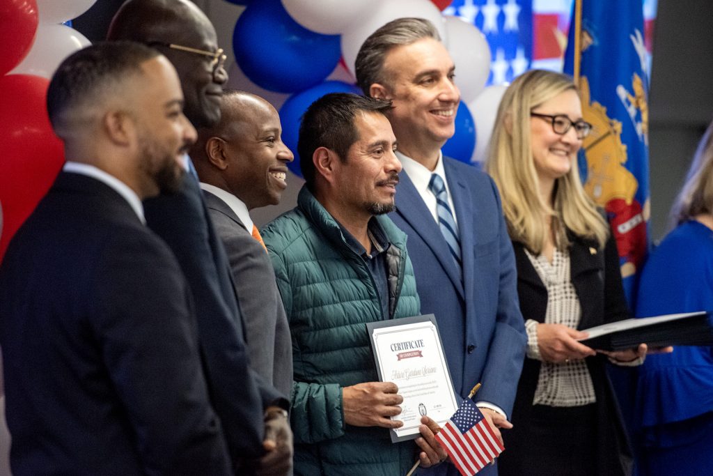 Students are recognized for earning their US citizenships Monday, Nov. 18, 2024, at Milwaukee Area Technical College in Milwaukee, Wis. Angela Major/WPR