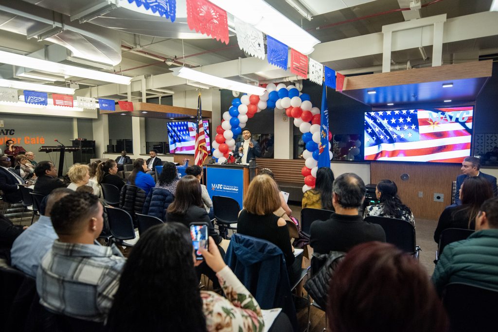 Student and new US citizen Daniel Rosario Sánchez speaks to attendees Monday, Nov. 18, 2024, at Milwaukee Area Technical College in Milwaukee, Wis. Angela Major/WPR