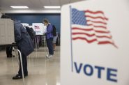 Jennifer Taylor, left, votes during Election Day on Nov. 5, 2024, at Madison East High School in Madison, Wis. (Joe Timmerman / Wisconsin Watch)