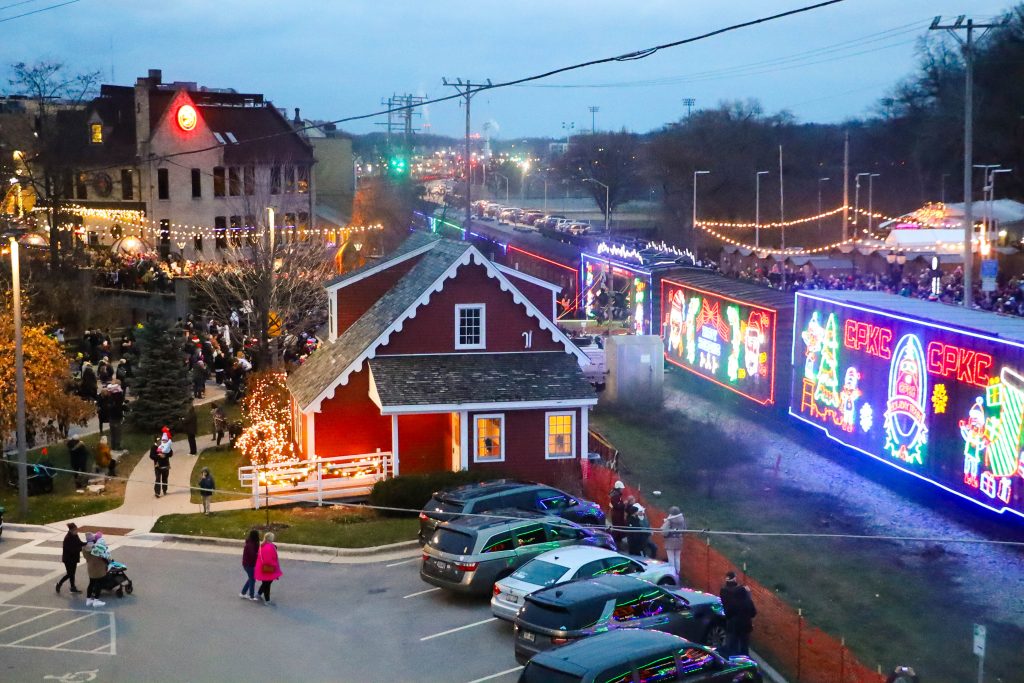 View of train from Harmonee bridge. Village of Wauwatosa Business Improvement District.