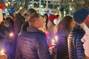 Several hundred people gathered on the Capitol Square in Madison Tuesday evening for a vigil following a school shooting Monday that left three dead and injured six other people. (Erik Gunn | Wisconsin Examiner)