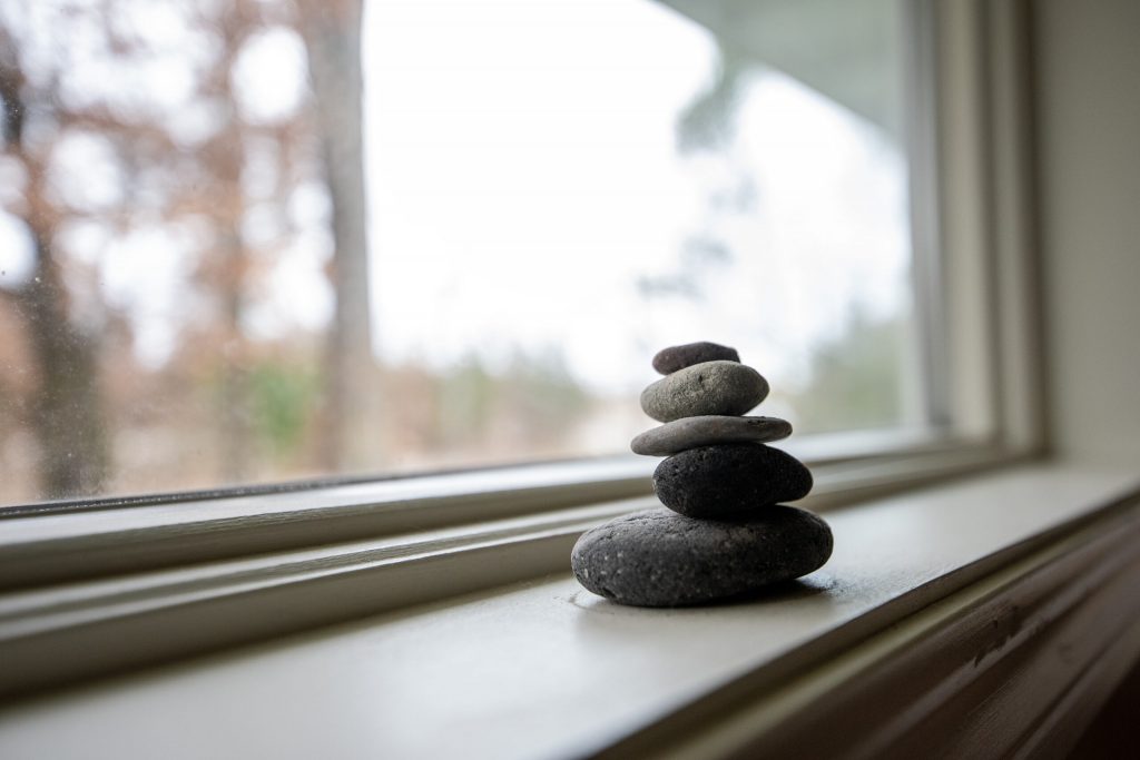 Rock cairns that Sally has collected from her hiking trips are displayed in her home Thursday, Nov. 21, 2024, in Wisconsin. Angela Major/WPR