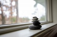 Rock cairns that Sally has collected from her hiking trips are displayed in her home Thursday, Nov. 21, 2024, in Wisconsin. Angela Major/WPR