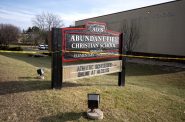 Police tape surrounds Abundant Life Christian School a day after a fatal shooting Tuesday, Dec. 17, 2024, in Madison, Wis. Angela Major/WPR