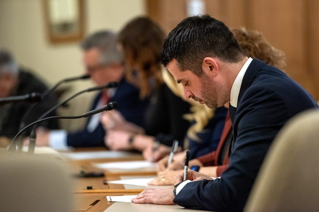 Fond du Lac District Attorney Eric Toney fills out a ballot alongside the other electors Tuesday, Dec. 17, 2024, at the Wisconsin State Capitol in Madison, Wis. Angela Major/WPR