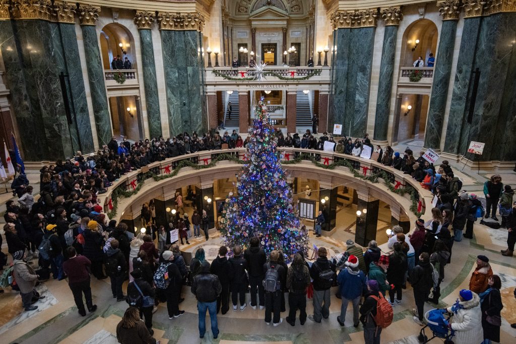 Student protesters stand in the Wisconsin State Capitol to stand against gun violence Friday, Dec. 20, 2024, in Madison, Wis. Angela Major/WPR