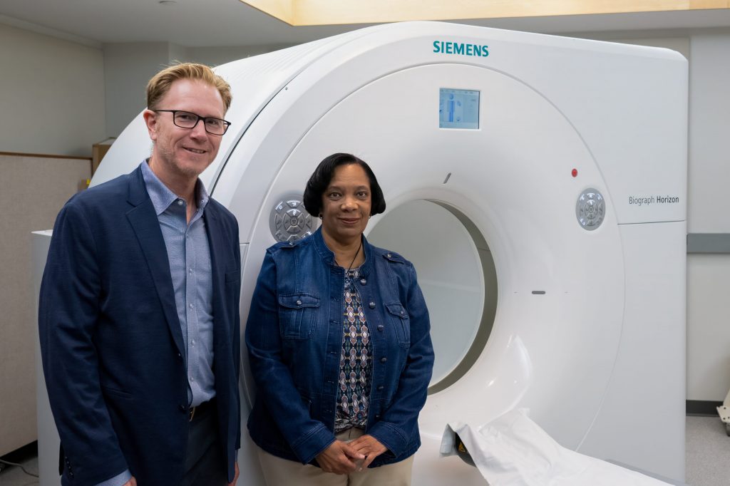 Barbara Smith Ballen, right, from Madison stands with UW-Madison professor Sterling Johnson. Smith Ballen was one of the first participants in a national study on Alzheimer’s disease. Photo courtesy of UW-Madison