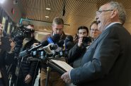 GOP attorney and former judge Jim Troupis speaks to reporters in Madison after making an initial appearance on 11 felony charges tied to his role in the 2020 false elector plot that aimed to overturn President-elect Donald Trump’s Wisconsin loss to President Joe Biden. Anya Van Wagtendonk/WPR