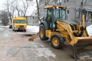 Milwaukee Water Works employees work to repair a water main break in 2021. Photo by Jeramey Jannene.