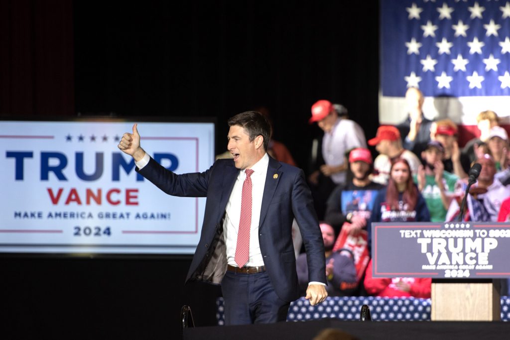 US Rep. Bryan Steil takes the stage before a JD Vance campaign event Monday, Oct. 28, 2024, at Racine Memorial Hall in Racine, Wis. Angela Major/WPR