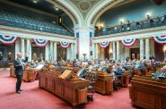 Assembly Speaker Robin Vos, R-Burlington, left, addresses the Wisconsin Assembly on Jan. 24, 2024, at the State Capitol in Madison, Wis., during a floor session. As 2025 starts, Vos is standing in the way of a bill expanding postpartum Medicaid coverage. (Andy Manis for Wisconsin Watch)