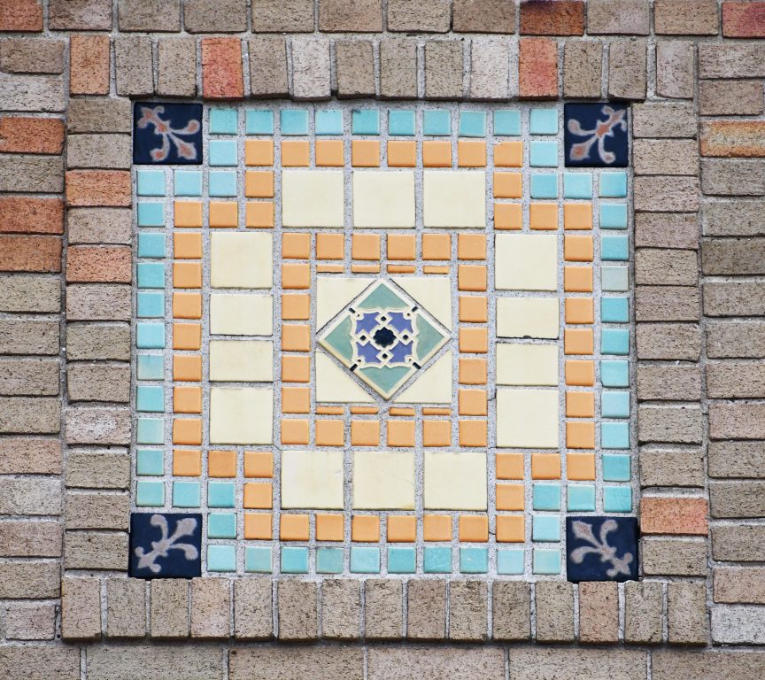 One of two panels on the façade of the Avalon Theater featuring Claycraft tile no. 1412 in the center. Photo by Ben Tyjeski.