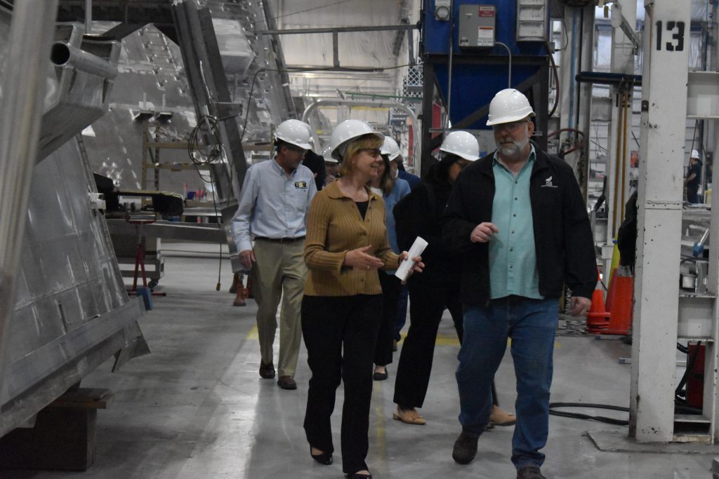 Wisconsin’s Democratic U.S. Sen. Tammy Baldwin, left, tours Fincantieri Ace Marine in Green Bay on April 22, 2024. She visited the plant to highlight a federal investigation into China’s alleged unfair trade practices. Joe Schulz/WPR