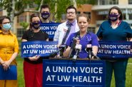 Registered nurse Tami Burns speaks during a May 2021 press conference calling on UW Health to recognize a nurses’ union. Around 2,500 nurses lost certification of their union in 2014 when their contract expired. Since then, UW Health has argued that Act 10 precludes the quasi-state health authority from signing a collective bargaining agreement with its workforce. Photo courtesy of SEIU Healthcare Wisconsin