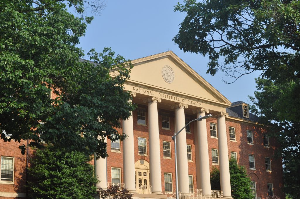 James H. Shannon Building (Building One), NIH campus, Bethesda MD. Photo credit: Lydia Polimeni, National Institutes of Health. (Public Domain)