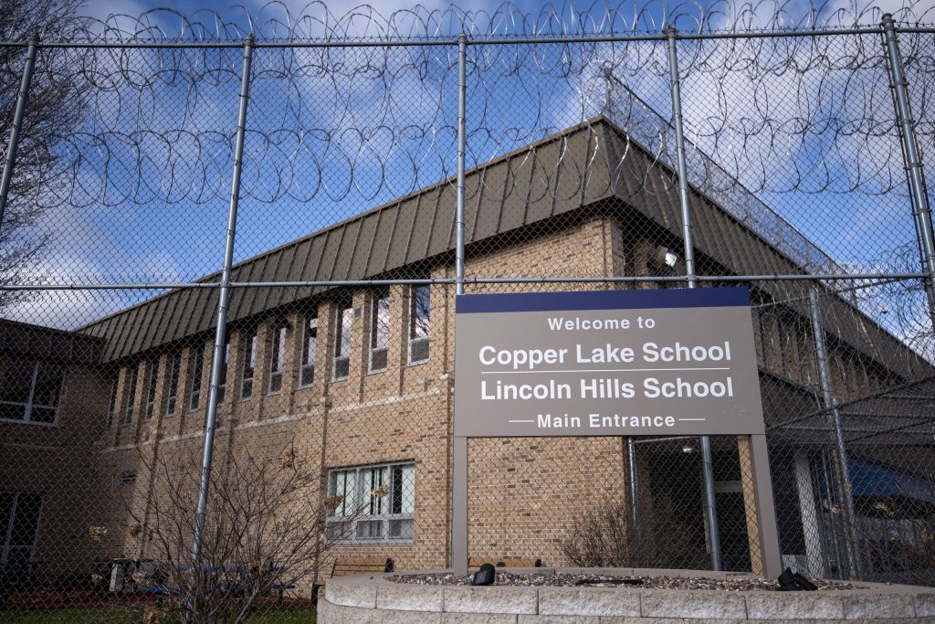 A fence surrounds Wisconsin’s Lincoln Hills youth prison Thursday, April 15, 2021, in Irma, Wis. Angela Major/WPR