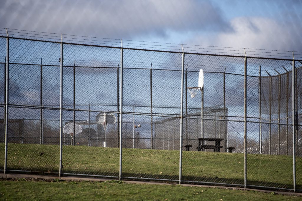 Basketball hoops and picnic tables are located behind the living units at Lincoln Hills youth prison Thursday, April 15, 2021, in Irma, Wis. Angela Major/WPR