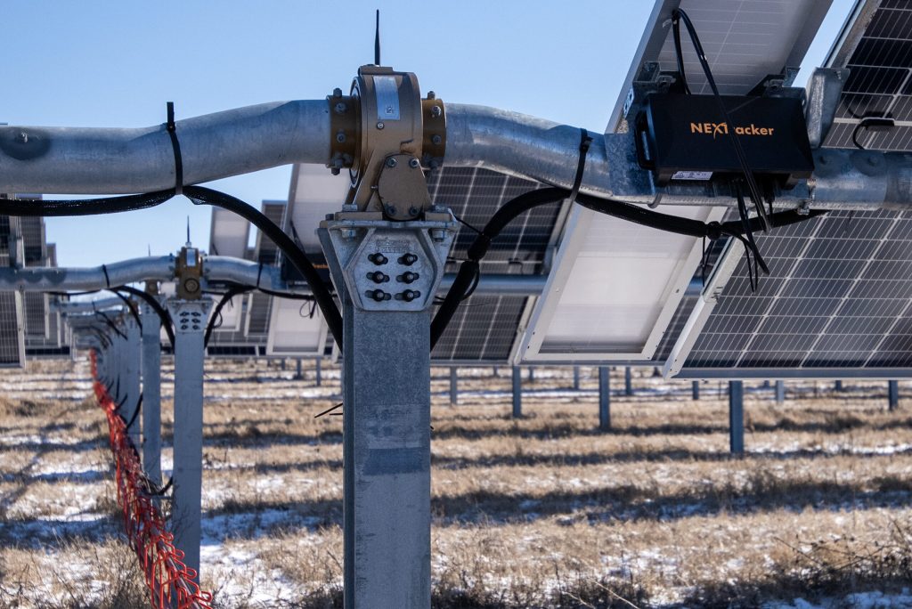 A device connected to the solar panels allows for them to follow the path of the sun Friday, Jan. 24, 2025, in Union Grove, Wis. Angela Major/WPR