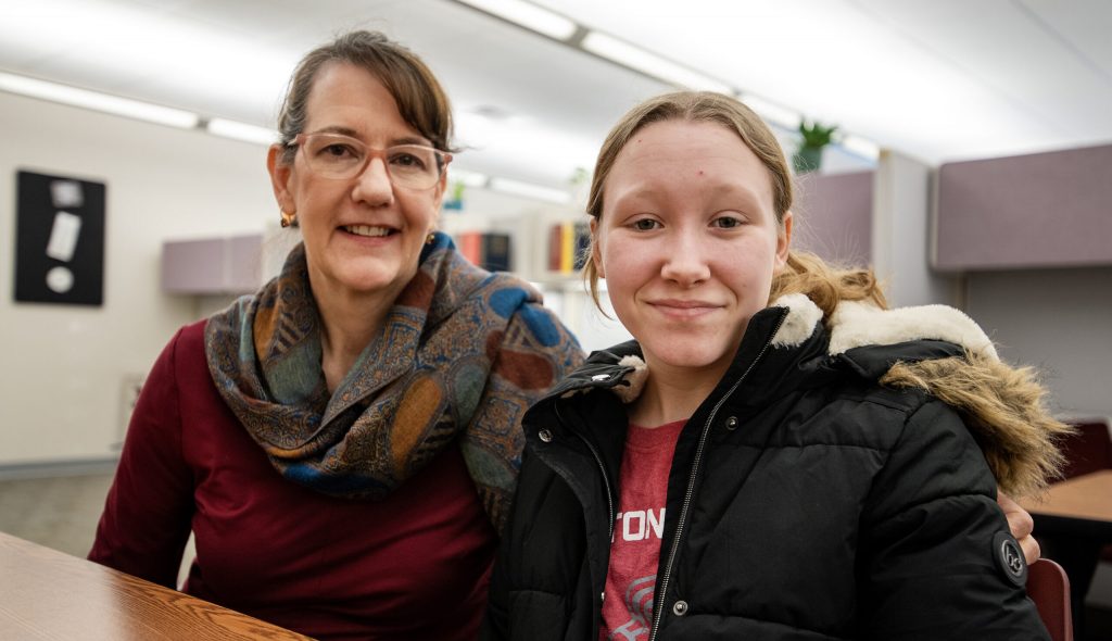 Maria Luther, the founder of Autumn Hill Academy, and her daughter, Britney Seaborn, sit together inside a future learning space Saturday, Feb. 22, 2024, in Pewaukee, Wis. Angela Major/WPR