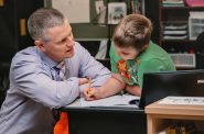 Sauk Prairie Superintendent Jeff Wright, who is running for state superintendent, with a student. Photo courtesy of campaign.