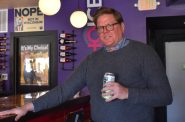 Kirk Bangstad holds a can of “Nope, Not My President” sparkling water at the Minocqua Brewing Company Taproom in Madison, Feb. 4, 2024. Bangstad’s business and his political action committee are entwined. Rob Mentzer/WPR