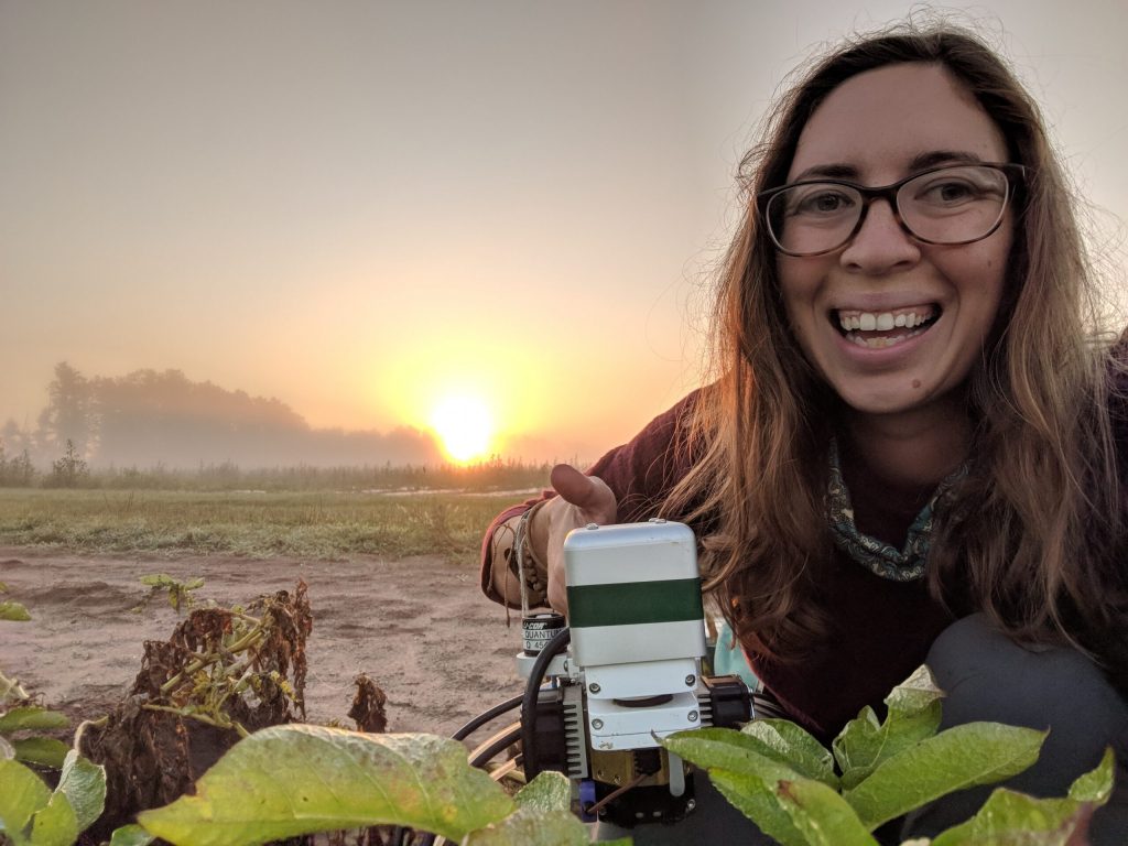 During her Ph.D. program at UW-Madison, Tracy Campbell did a lot of farm-based research. Here, she is measuring the rate of photosynthesis in a potato cropping system at Hancock Agricultural Research Station in the Central Sands region, July 2020. Photo courtesy of Tracy Campbell