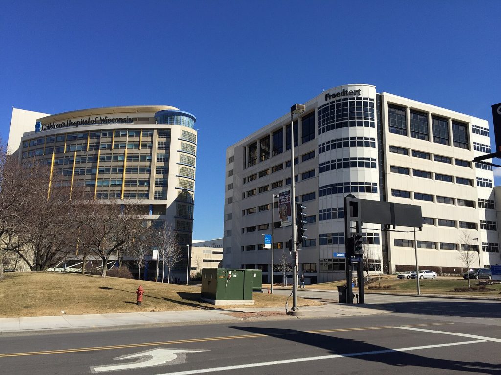 The Gender Health Clinic at Children’s Wisconsin hospital in Milwaukee, shown on the left, canceled and then reinstated a transgender girl’s appointment after President Donald Trump signed an executive order blocking funding for hospitals that provide such therapy. (Aalvarez89 via Wikimedia Commons)