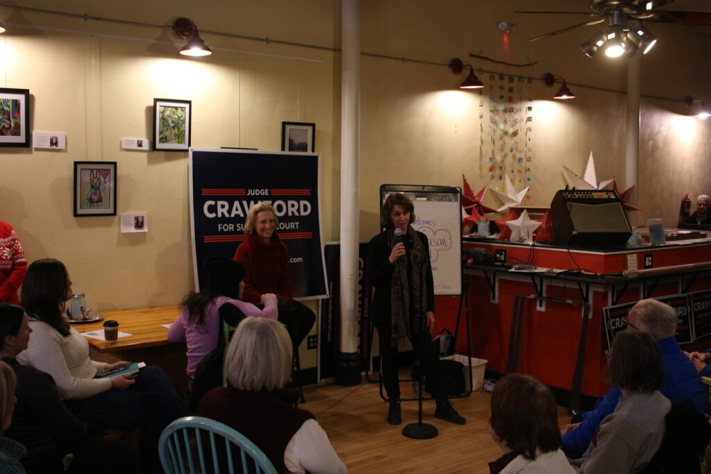 Wisconsin Supreme Court candidate Susan Crawford addresses voters at a campaign event in Oregon on Feb. 7. (Henry Redman | Wisconsin Examiner)