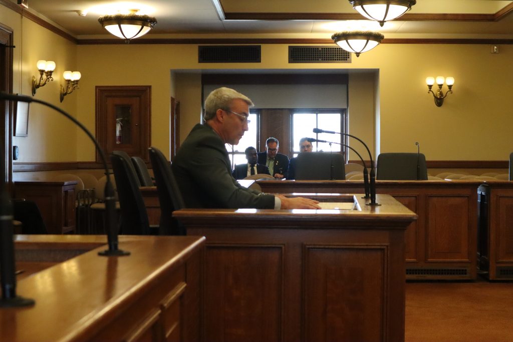 Rep. Rob Hutton (R-Brookfield), to his left sits Joseph Mensah, formerly of the Wauwatosa Police Department and now a Waukesha County Sheriff Department detective. (Photo by Isiah Holmes/Wisconsin Examiner)