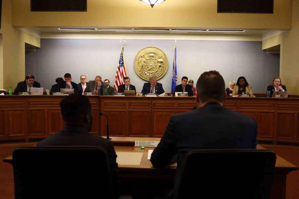 The Senate Committee on Judiciary and Public Safety. Seated at the table are Detective Joseph Mensah (left) and Wisconsin Fraternal Order of Police President Ryan Windorff (right) (Photo by Isiah Holmes/Wisconsin Examiner)