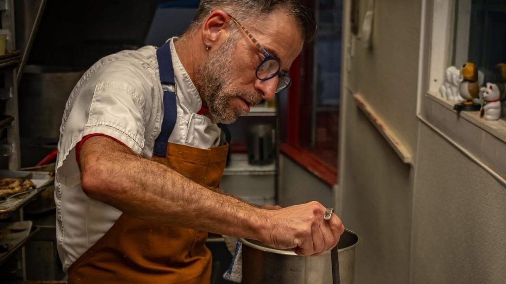 Amilinda owner and chef Gregory León prepares a dish. Photo courtesy Gregory León