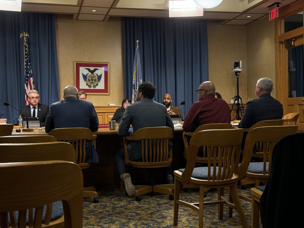 Health department and Milwaukee Public Schools officials attend a Feb. 21, 2025 meeting at Milwaukee City Hall. Evan Casey/WPR