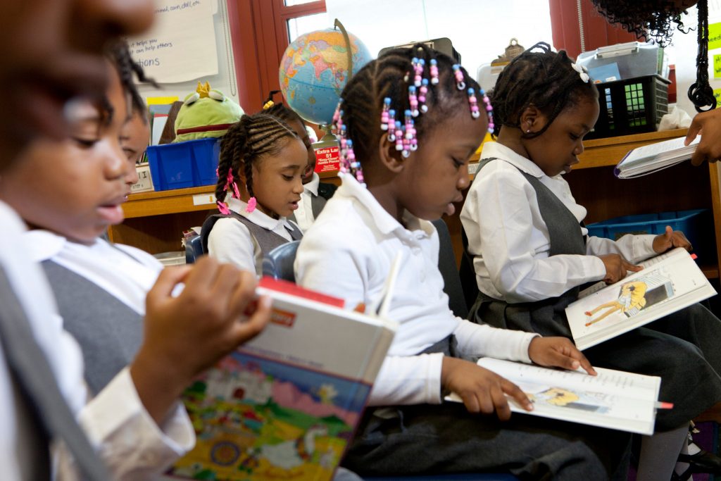 Children reading in Jacksonville, Florida with Teach for America. Business Wire